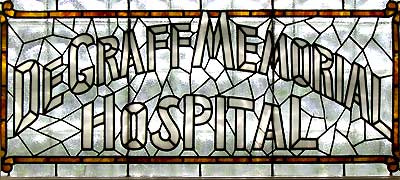 Stained glass window in museum collection. Taken from DeGraff Memorial Hospital, North Tonawanda, NY.
